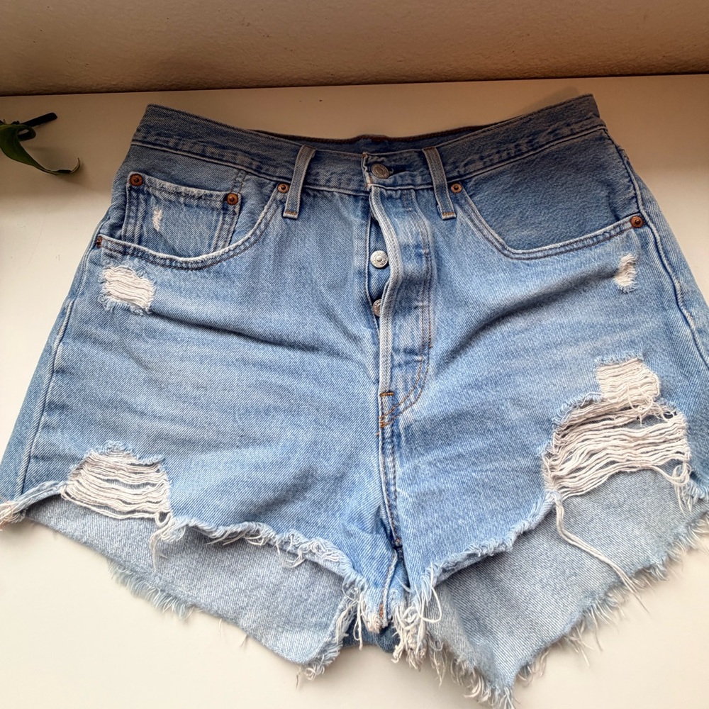 Levi’s 501 Light Blue Distressed Denim Cutoff Shorts